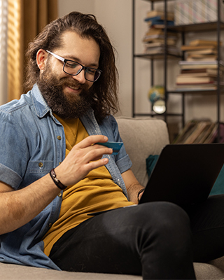 Close-up of a person using a banking app on a phone.